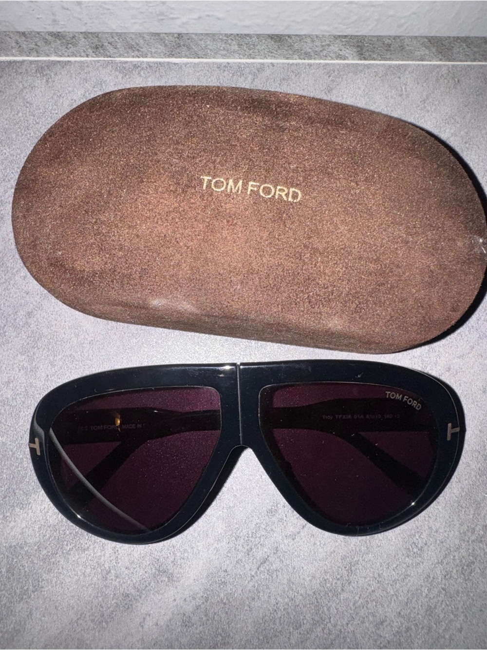 Tom Ford Black Frame Sunglasses with Dark Purple Lenses
